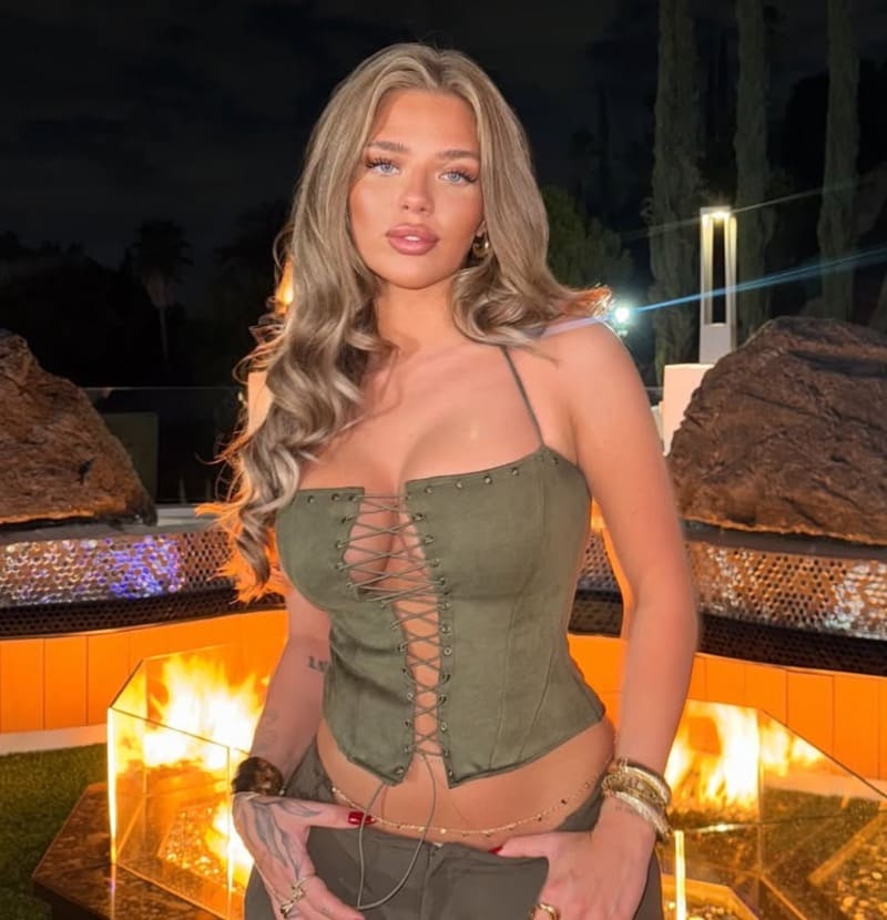 Hot blonde in green top