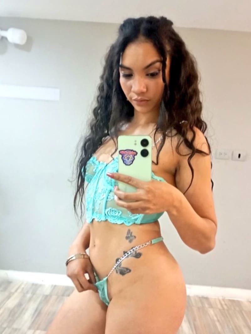 Andromeda in sexy green top