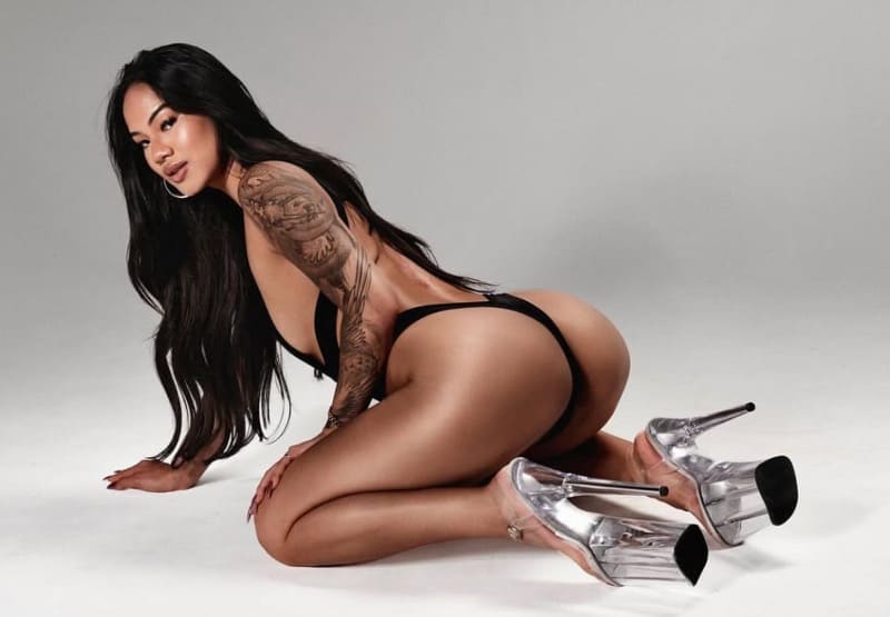 Asian model shows off perfect ass