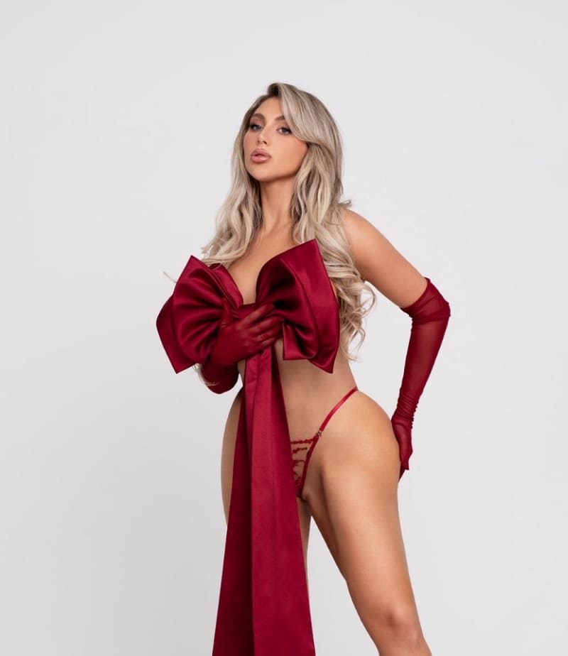 Sexy model with nice ass in mini red lingerie