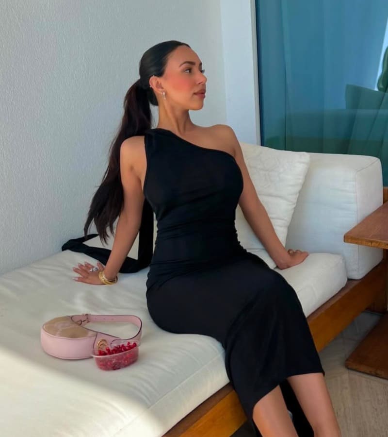 Gurneet in tight black dress