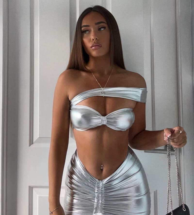 Madeline in sexy chrome outfit