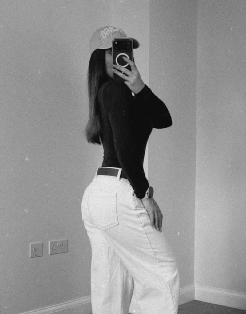 Sexy model in white pants