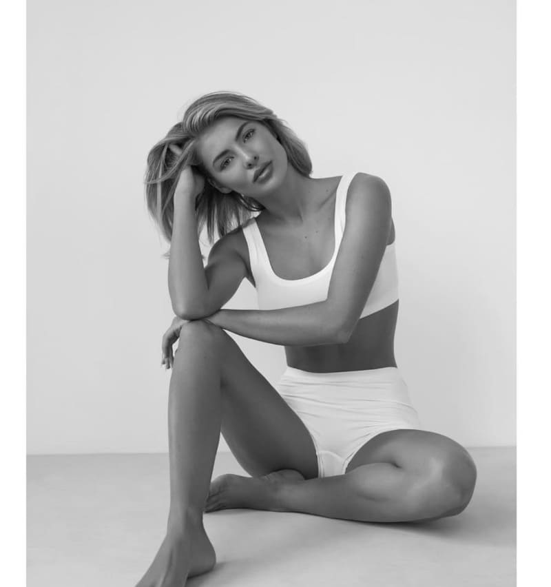 Emily in tight white sport outfit