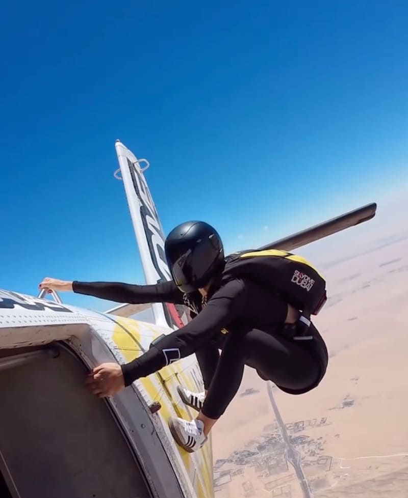 Brieana next to plane