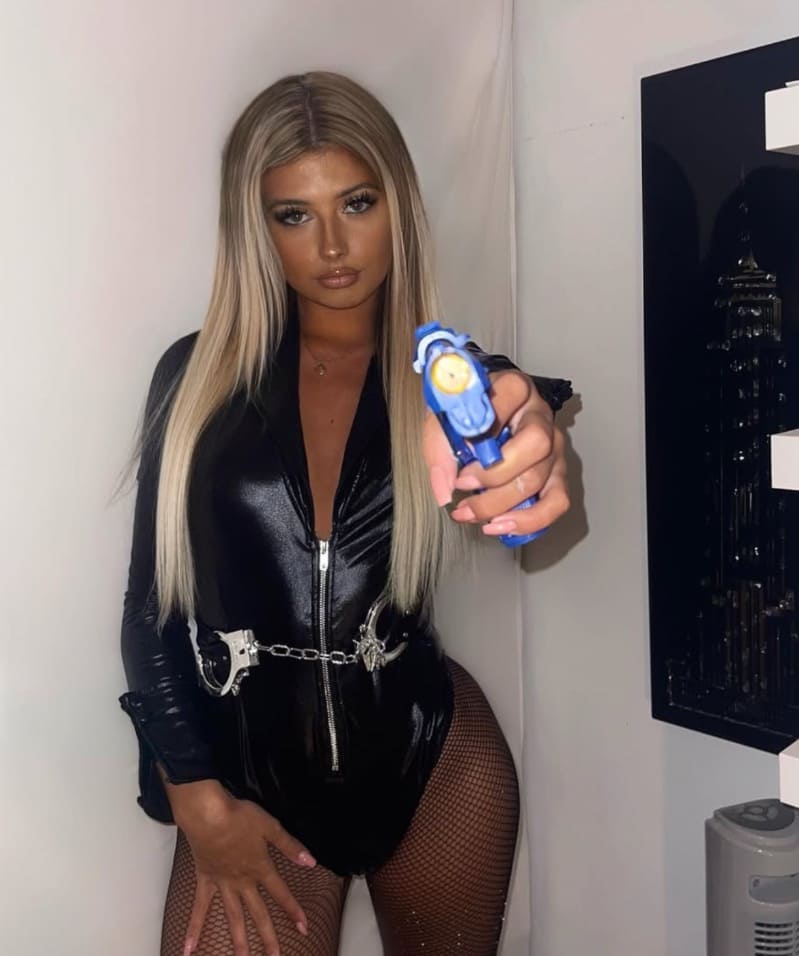 Sexy blonde model in tight outfit