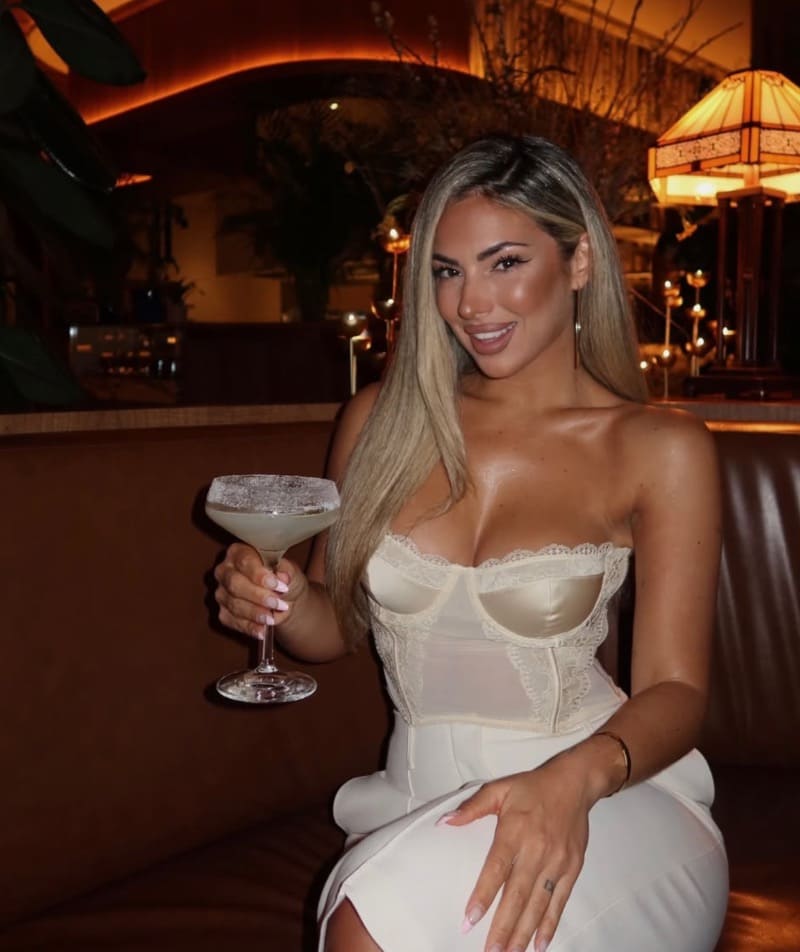 Laura in sexy white outfit