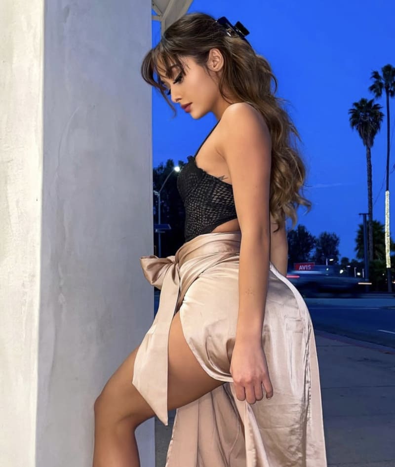 Sexy model in beige outfit