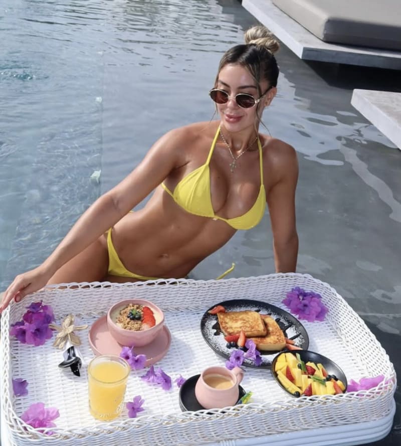 Sexy model in yellow bikini