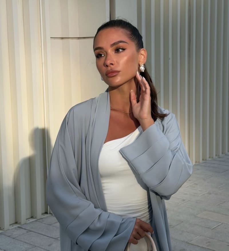 Sexy model in blue vest