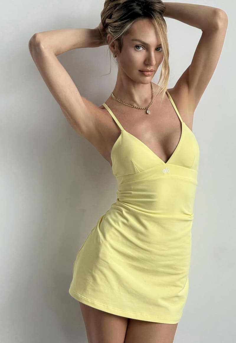 Sexy blonde in yellow dres
