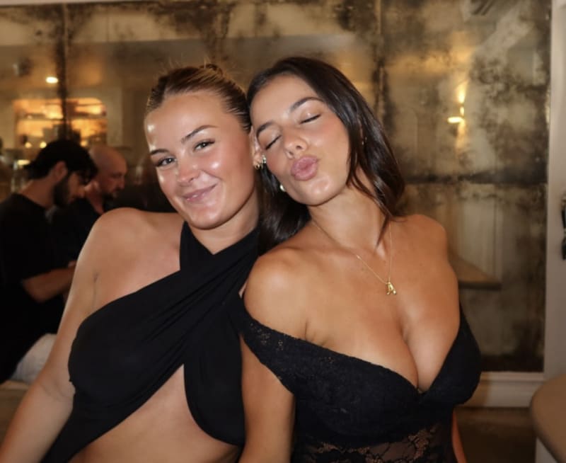 Ally in tight black dress with big cleavage