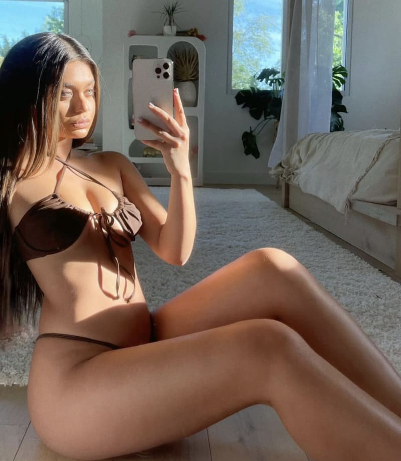Sofia in sexy lingerie on floor