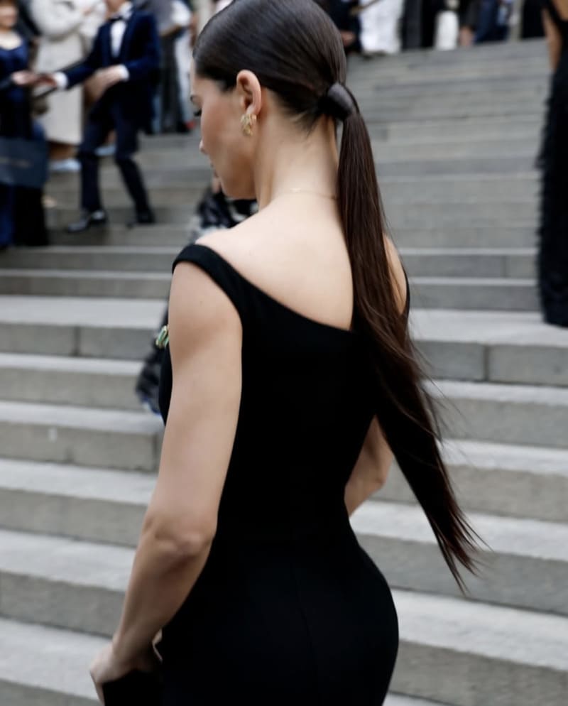 Adriana showing off big ass in tight dress