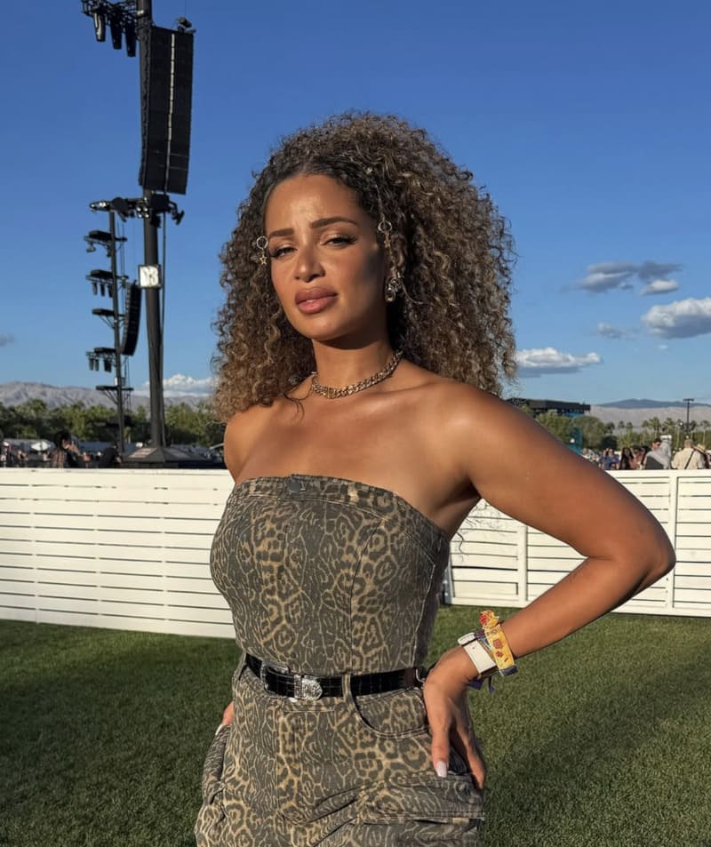 Tori in cool outfit with shoulderless top