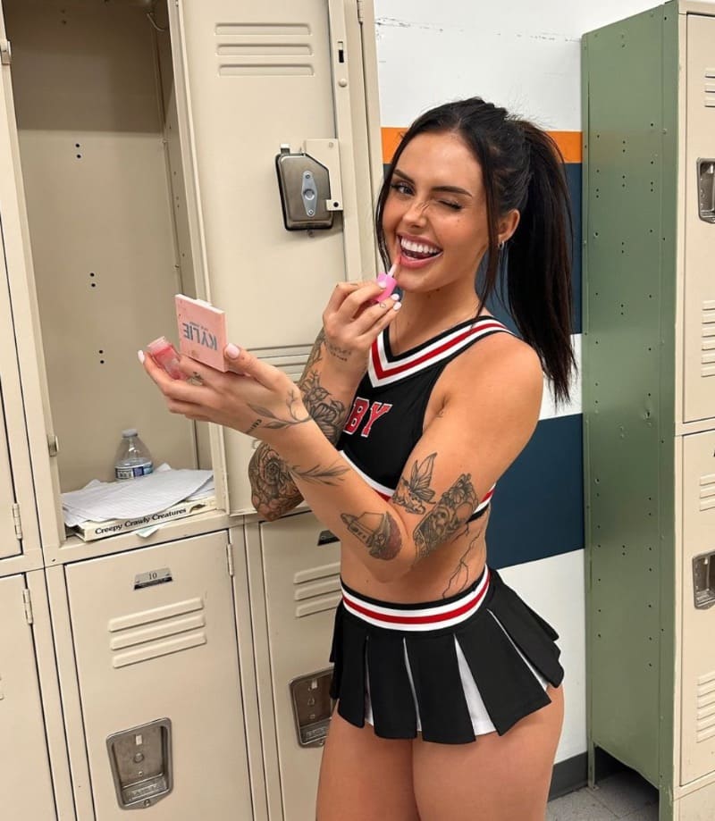 Kenna in chearleader outfit