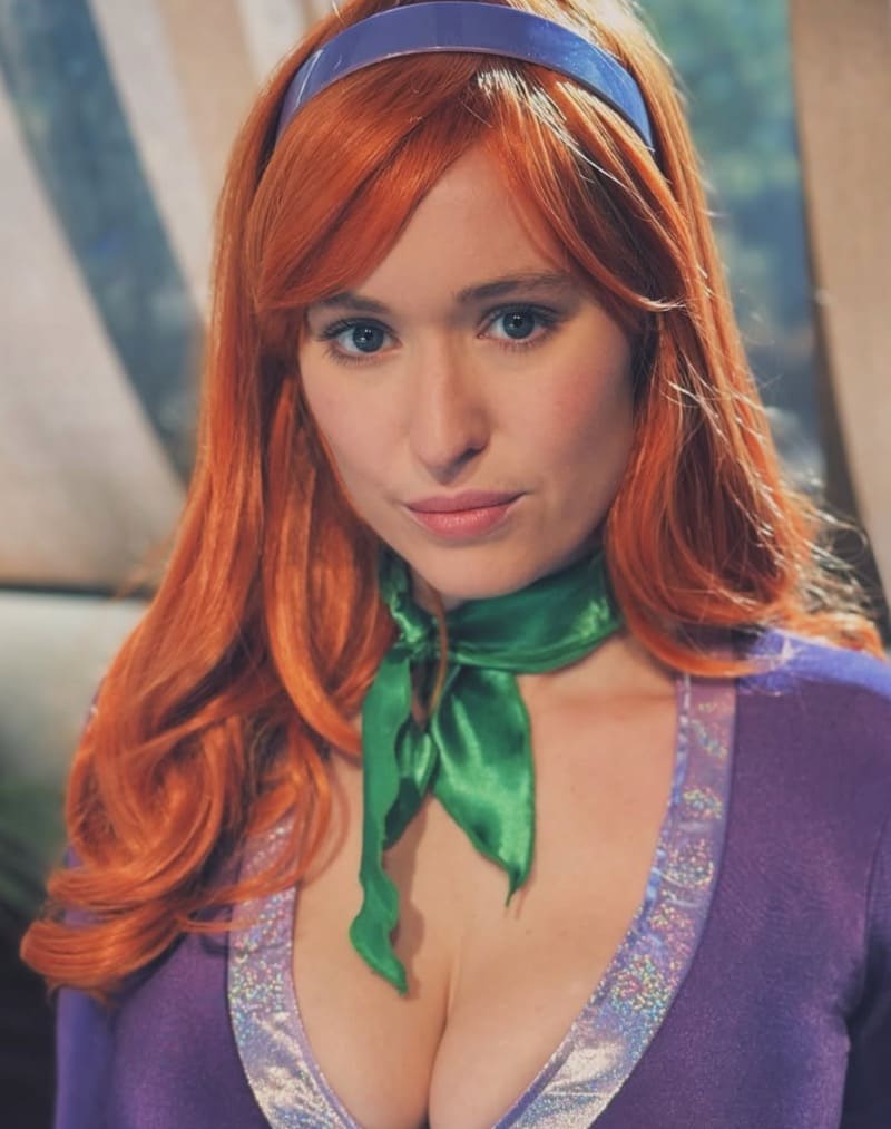 Charlie in sexy purple cosplay