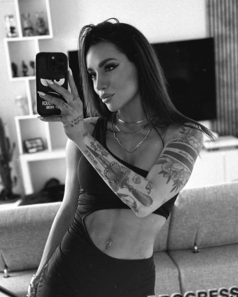 Sexy brunette in sport outfit