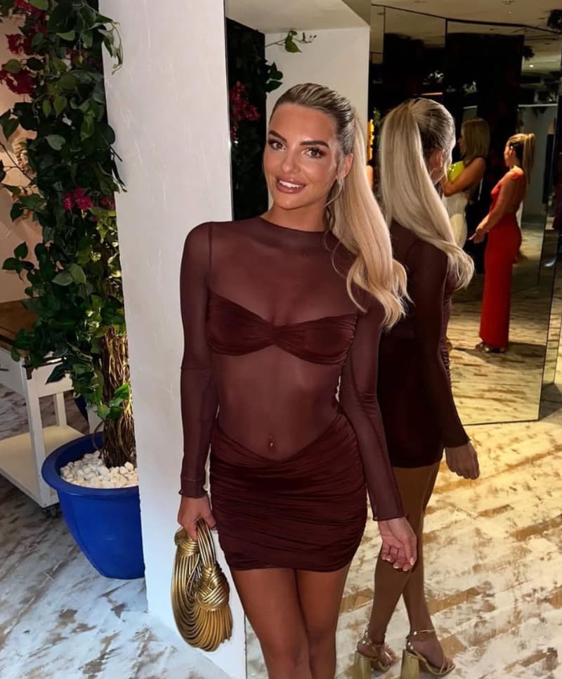 Gemma April in rode doorzichtige outfit
