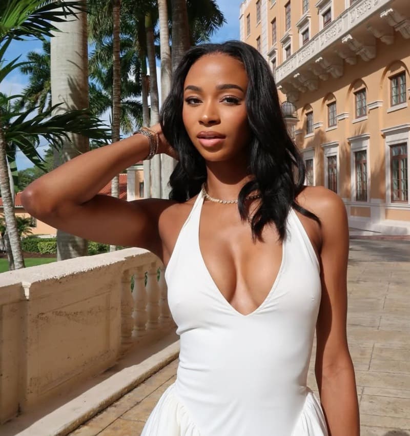 Knap model met dikke tieten in witte jurk