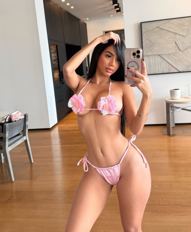 Sexy woman in nice flower bikini