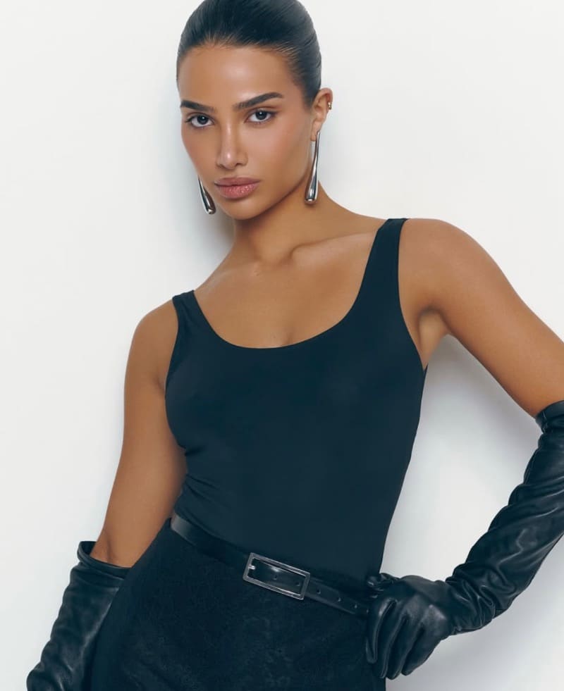 Sexy brunette in hete outfit