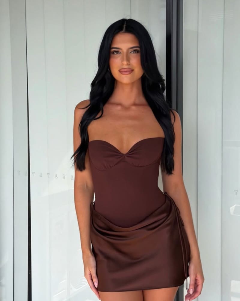 Keeley in sexy brown dress
