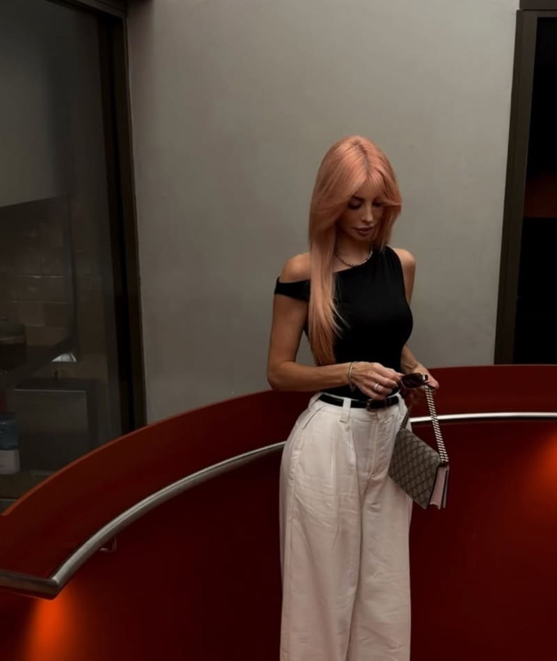 Carly in sexy outfit