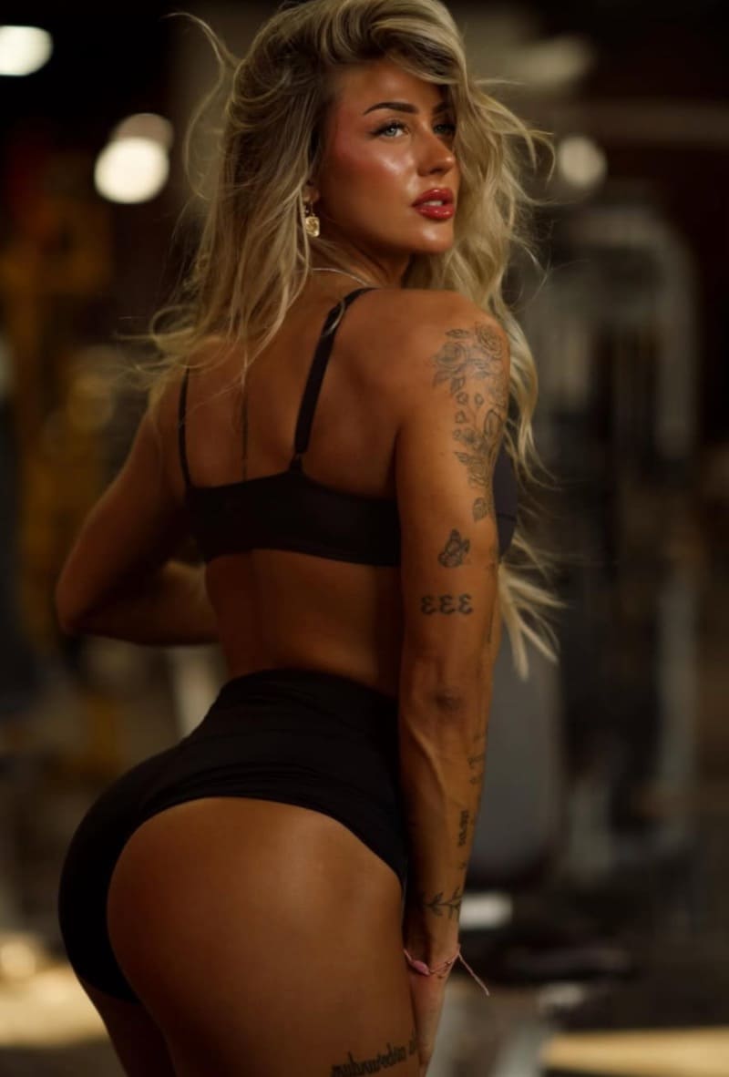 Sexy fitness model in mini outfit