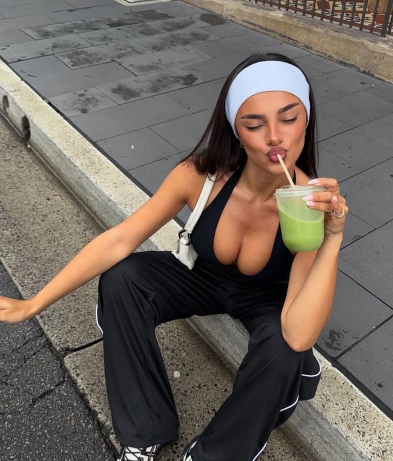 Babe in black top on street 